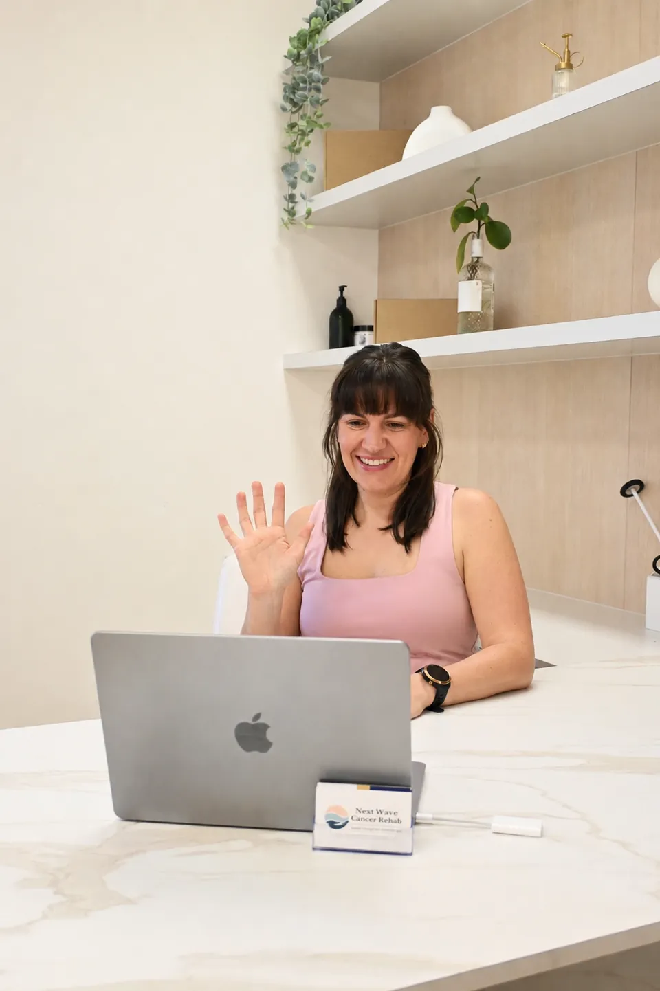 Megan Oster conducting a telehealth consultation